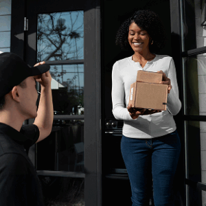 delivery-person-getting-parcel-out-delivery 1