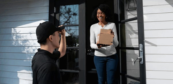 delivery-person-getting-parcel-out-delivery 1